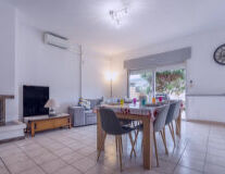 a kitchen with a dining room table